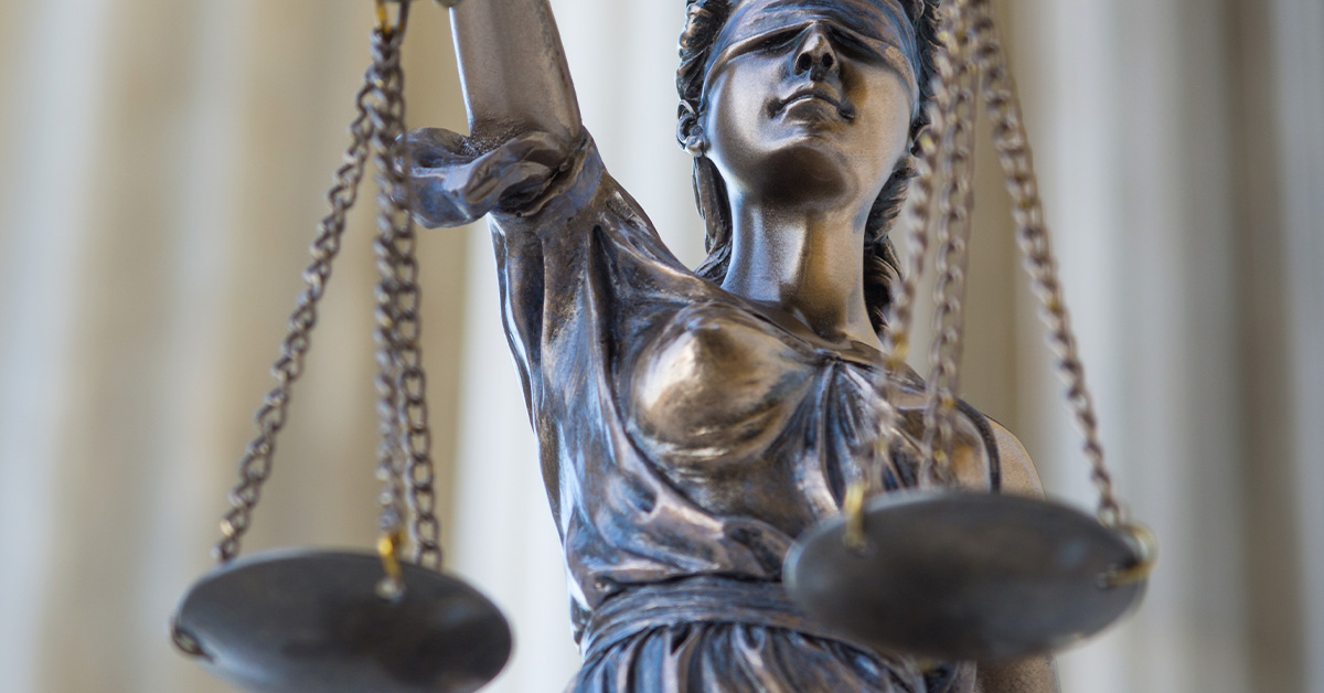 Statue of Lady Justice holding scales